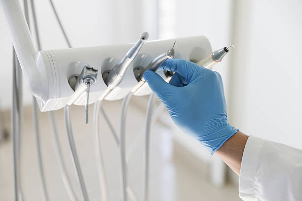 Professional Wisdom Tooth Removal technician working in Flanders, NY